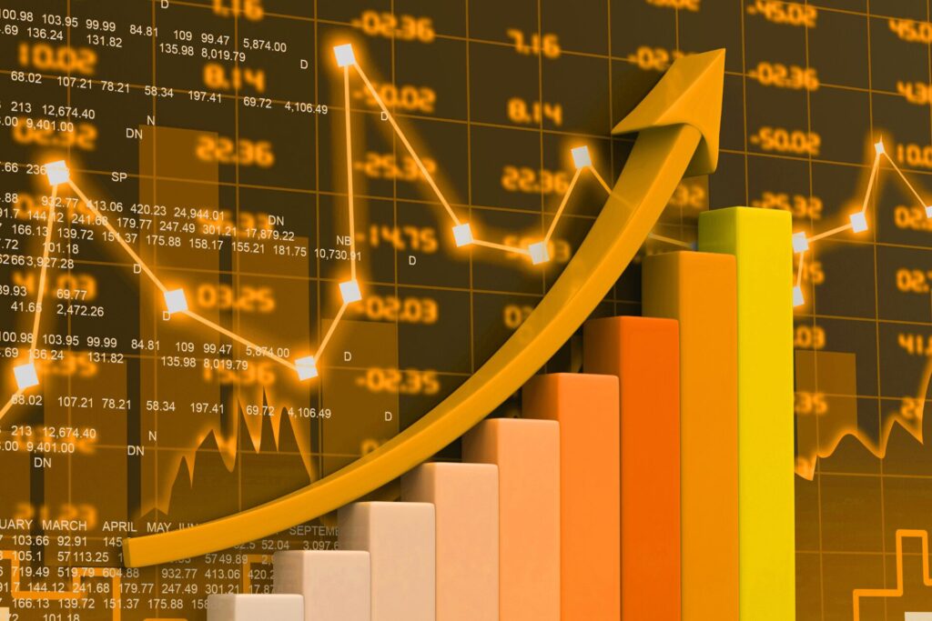 Bar chart with a rising arrow over market data, representing positive momentum and upward market movement.
